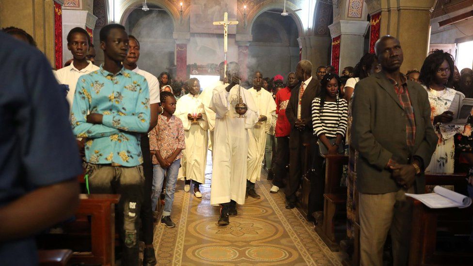 Christians attend a Christmas Mass at St. Matthew's Cathedral Church in Khartoum