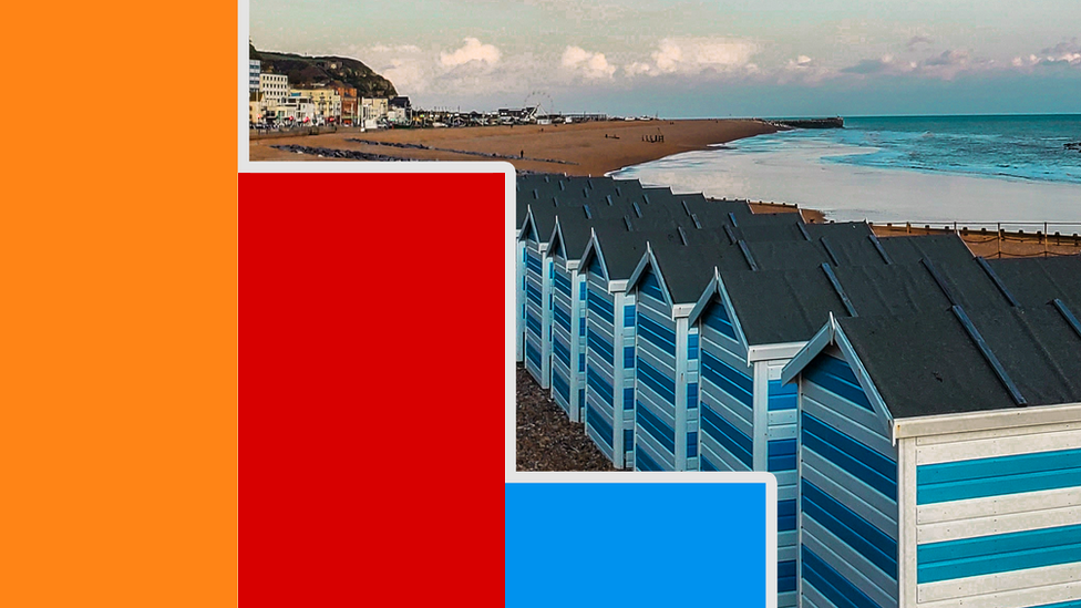 A bar chart over a picture of Hastings beach