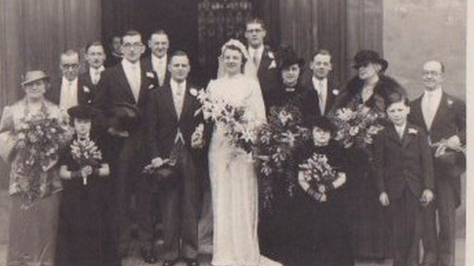 Photos found in Coventry post box reunited with family BBC News