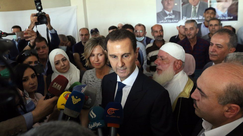 Bashar al-Assad after casting vote in Syria's election