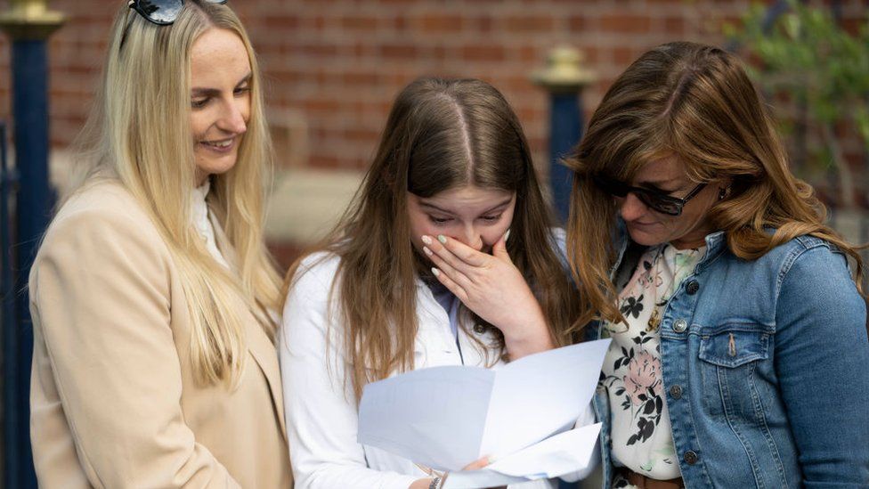 Family opening GCSE results