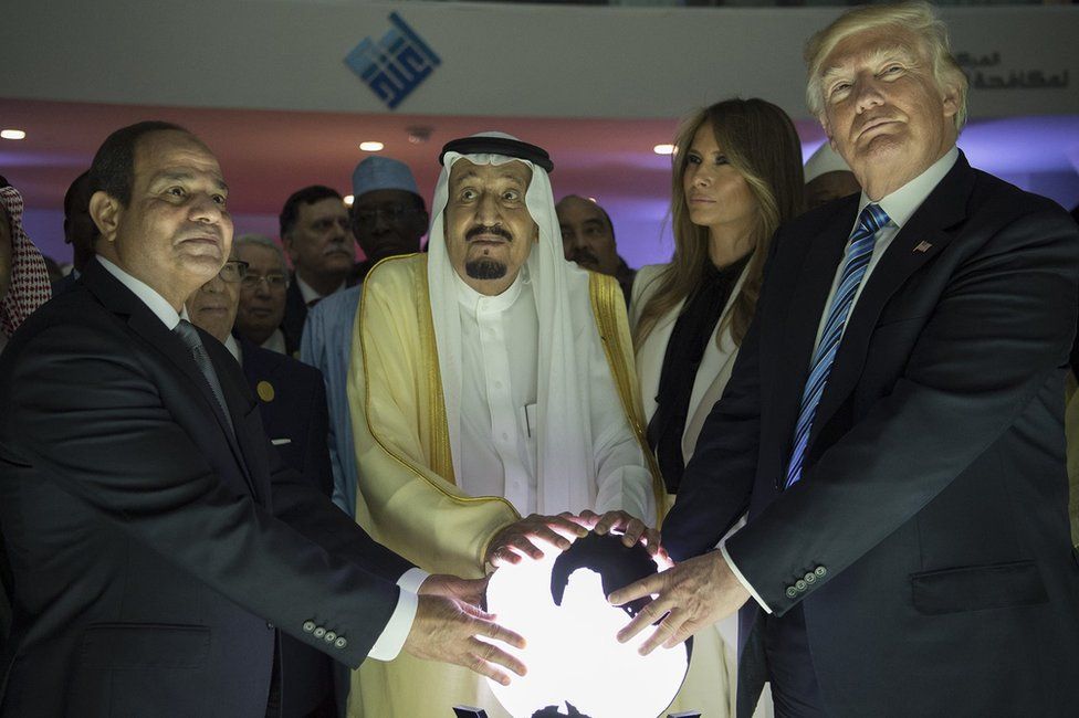 Egyptian President Abdul Fattah al-Sisi, Saudi Arabia's King Salman and US President Donald Trump hold a globe at an anti-extremism centre in Riyadh on 21 May 2017