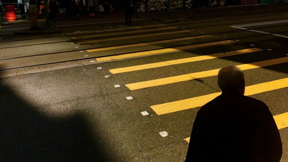Man crossing road in China