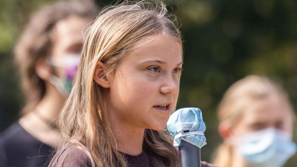 The Swedish climate activist Greta Thunberg speaks to the people during Fridays for Future Student strike held in Milan