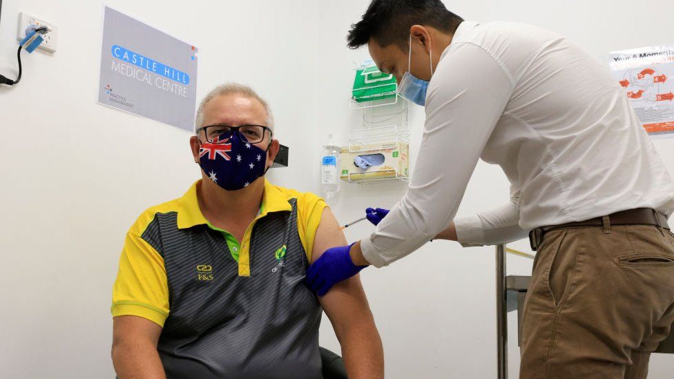 Australian PM is vaccinated as rollout begins - BBC News