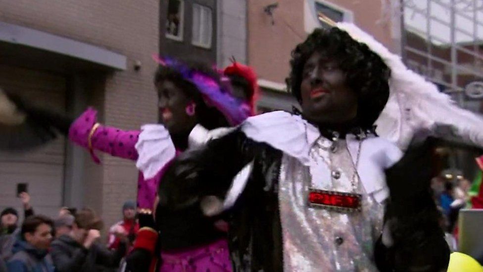 Dutch festivalgoers use black face paint to portray Black Pete