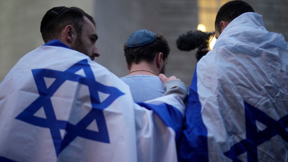 Members of the Jewish community attend a vigil for the victims of the recent attacks in Israel at Central Library, St Peter's Square, on October 11, 2023 in Manchester, United Kingdom.
