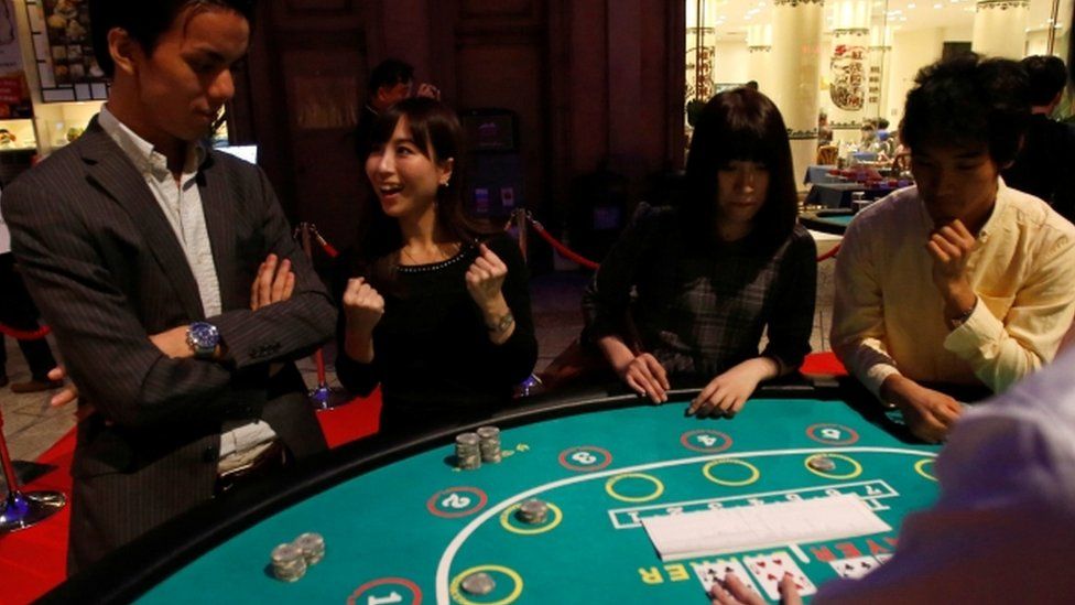 Japan MP arrested on suspicion of taking casino bribe - BBC News