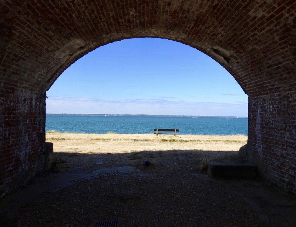 Ocean view through an archway