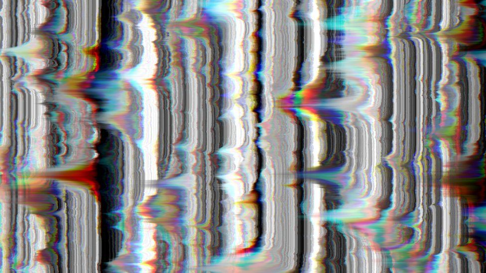 A white noise image on a screen