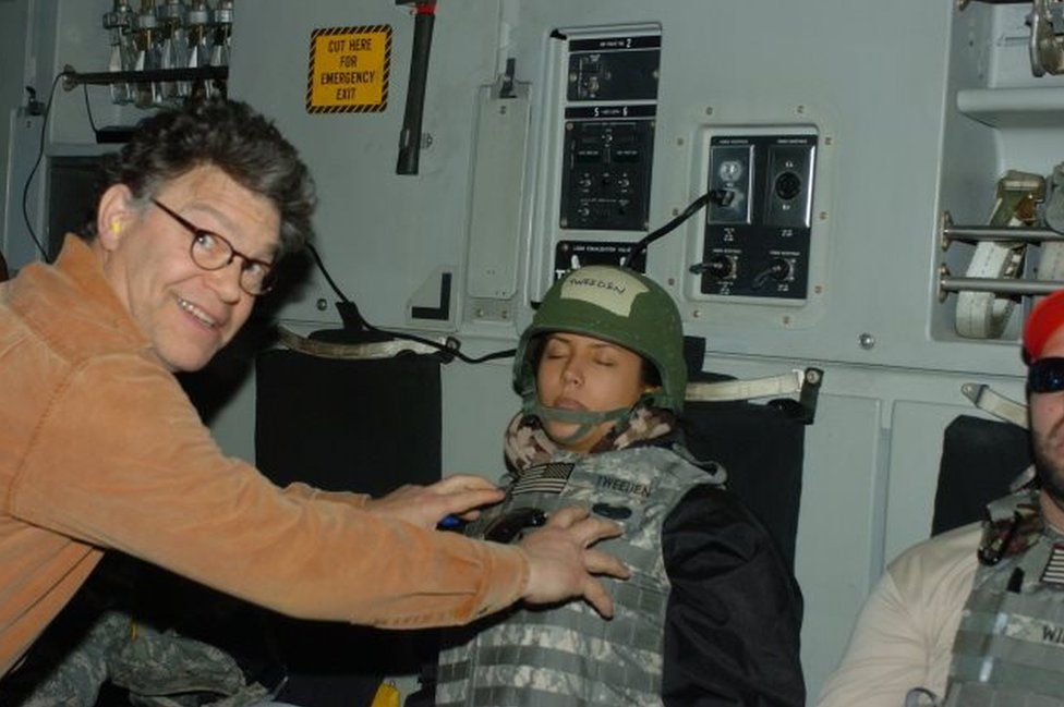 Franken gropes the accuser while smiling