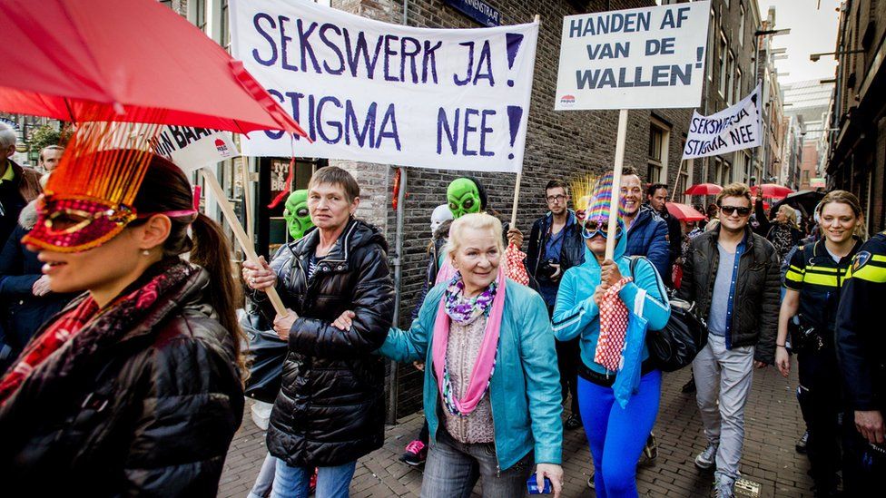 Sex workers and sympathisers demonstrate in April 2015 against the closure of window brothels by the municipality in the red light district in Amsterdam.