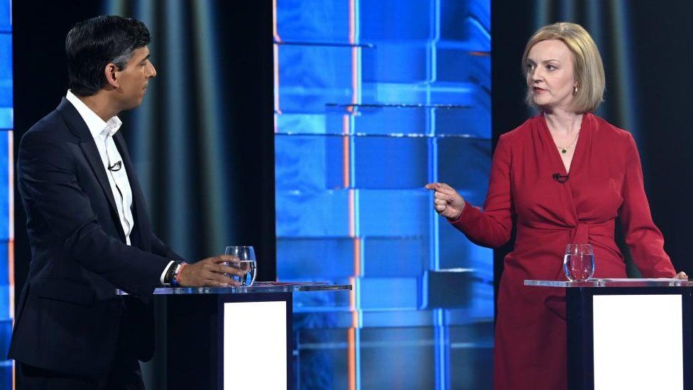 Rishi Sunak and Liz Truss on stage at a televised debate as part of the Tory leadership race