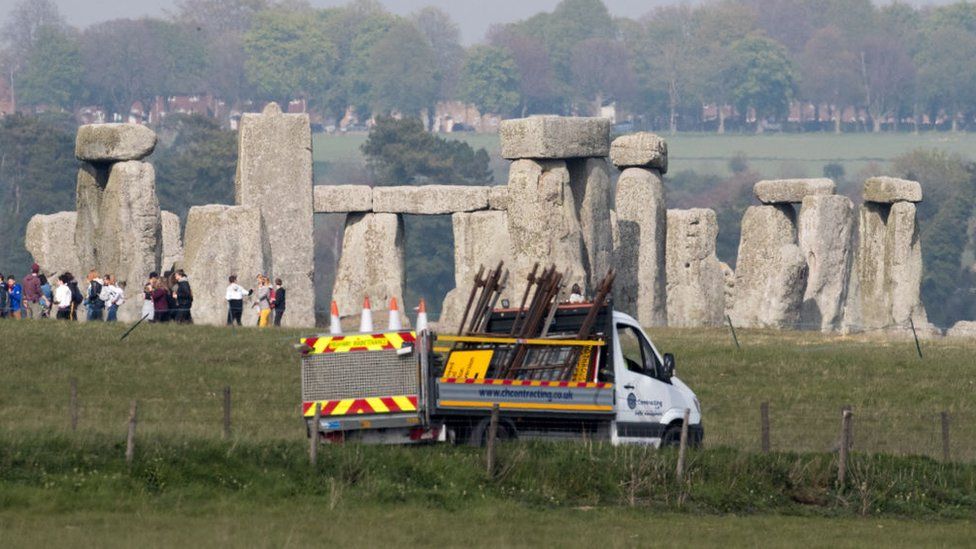 Stonehenge with construction vehicle in front of it