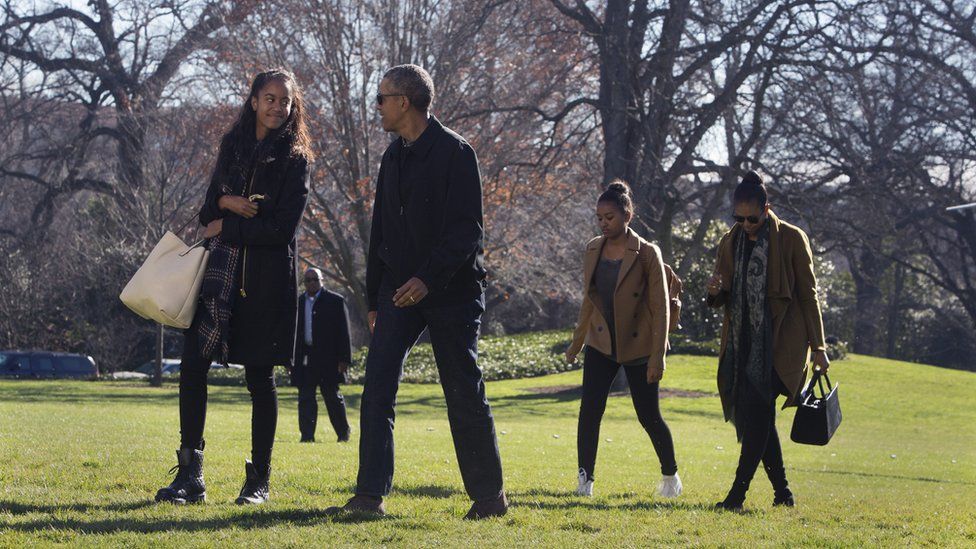 US president Barack Obama, daughters Malia(L) and Sasha(2nd R) and First Lady Michelle Obama return to The White House in Washington DC, after vacationing in Hawaii.
