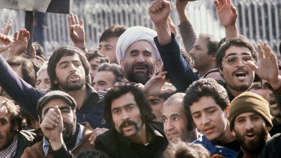 A crowd welcomes Ayatollah Ruhollah Khomeini at Tehran's international airport after his return from exile (1 February 1979)