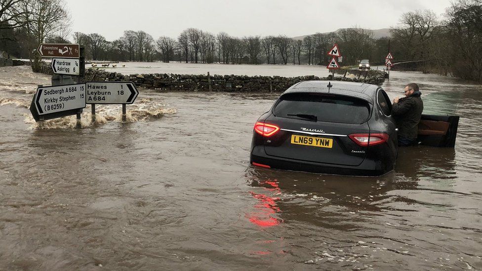 A car in floods in Hawes