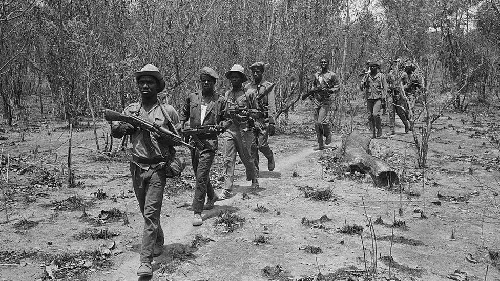 A rebel army on patrol armed with some of the issued range of Russian weapons during the Portuguese Colonial War, Guinea-Bissau, West Africa, 1972