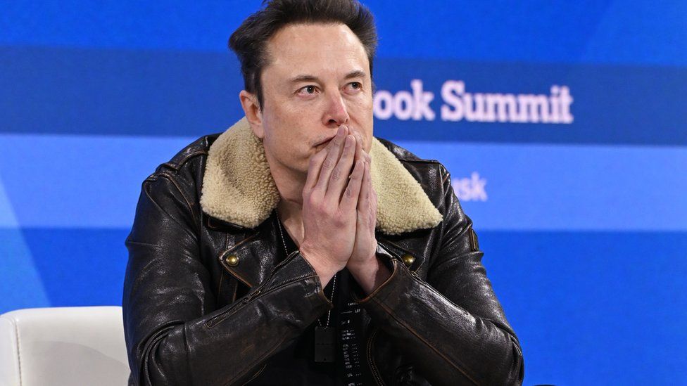 Elon Musk sits for an interview at DealBook Summit