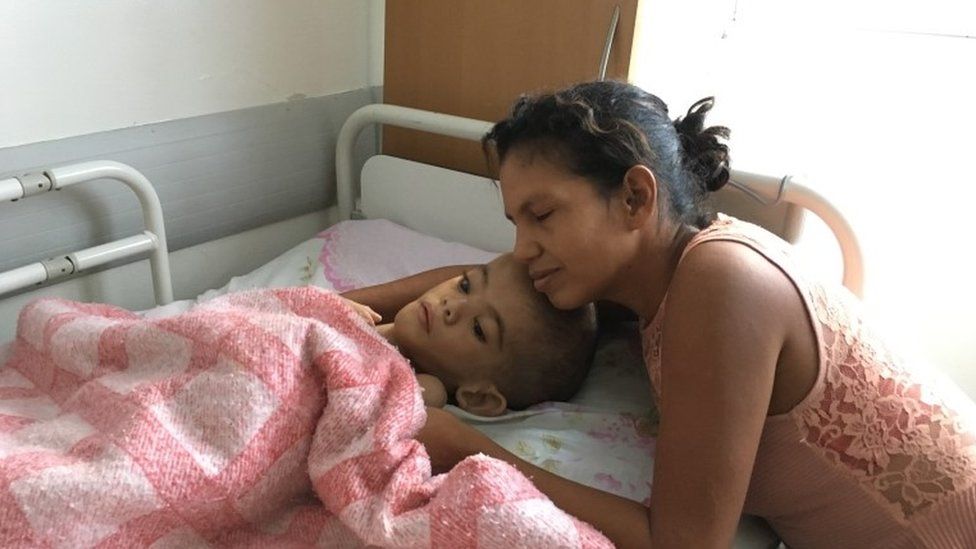 Mother of Alejandro, 11 year boy being treated for malnutrition in Caracas Children's Hospital