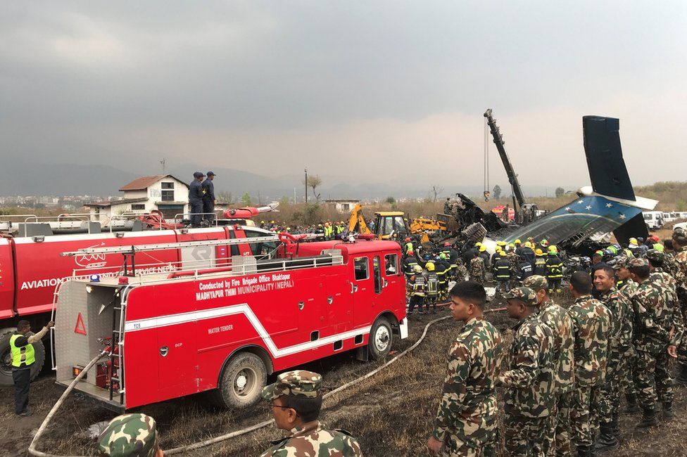 Wreckage of the plane at Kathmandu airport, Nepal, 12 March 2018