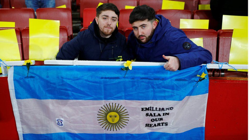 Cardiff fans holding an Argentina flag
