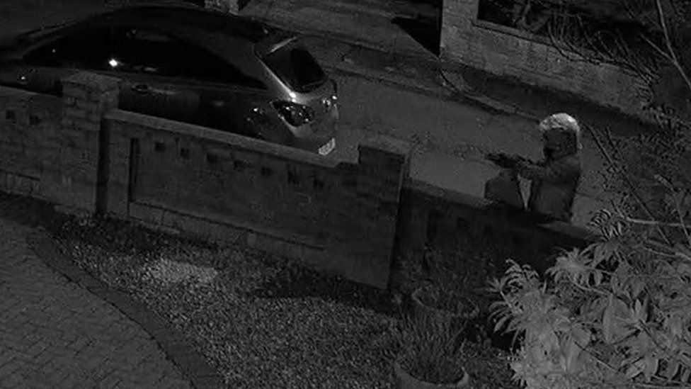 CCTV Images Of Man Firing Sawn-off Shotgun At Bolton House - BBC News