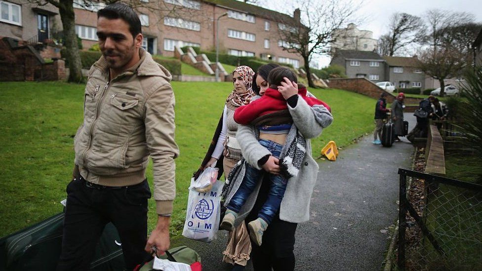 Picture of Syrian refugees arriving in the Isle of Bute, Scotland