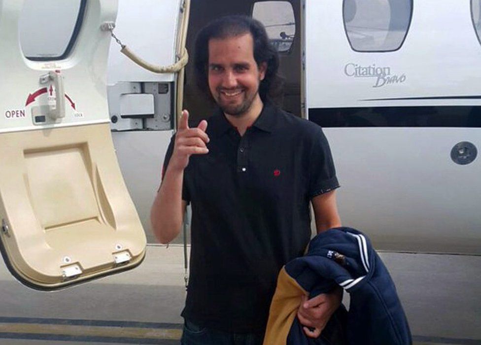 A handout picture released by the Inter Services Public Relations of Pakistan (ISPR) on 9 March 2016 show Shahbaz Taseer, son of slain Punjab governor Salman Taseer, gesturing before boarding a chartered plane in Quetta on his way to Lahore, Pakistan, 9 March 2016.