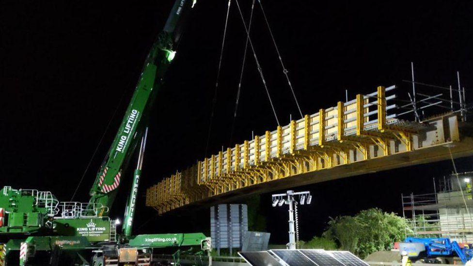 New beams that form part of the bridge being put in place