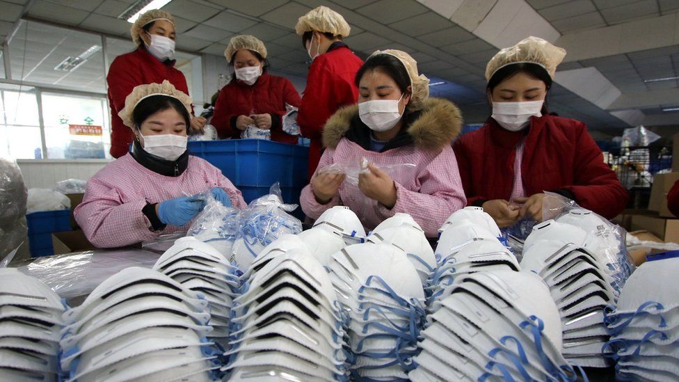 Workers making protective masks