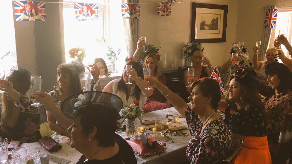 Picture: Party goers at the Glantaff in Quakers Yard toast the royal couple
