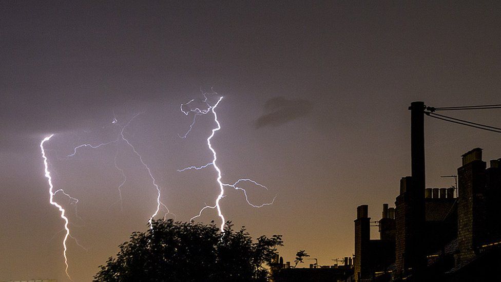 Lightning strikes coming down on the other side of Ocean Terminal in Leith