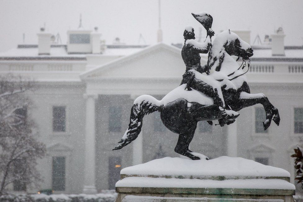 Statue of Andrew Jackson covered in snow