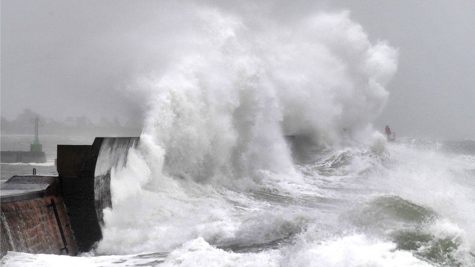 High waves at a jetty in Plobannalec-Lesconil in Brittany, France, 9 February 2020