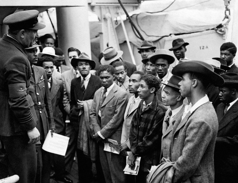RAF officials from the Colonial Office welcomed Jamaican immigrants when HMT 'Empire Windrush' landed at Tilbury.