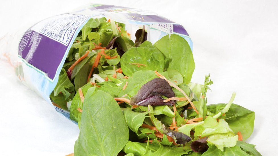 A stock image of a bag of salad