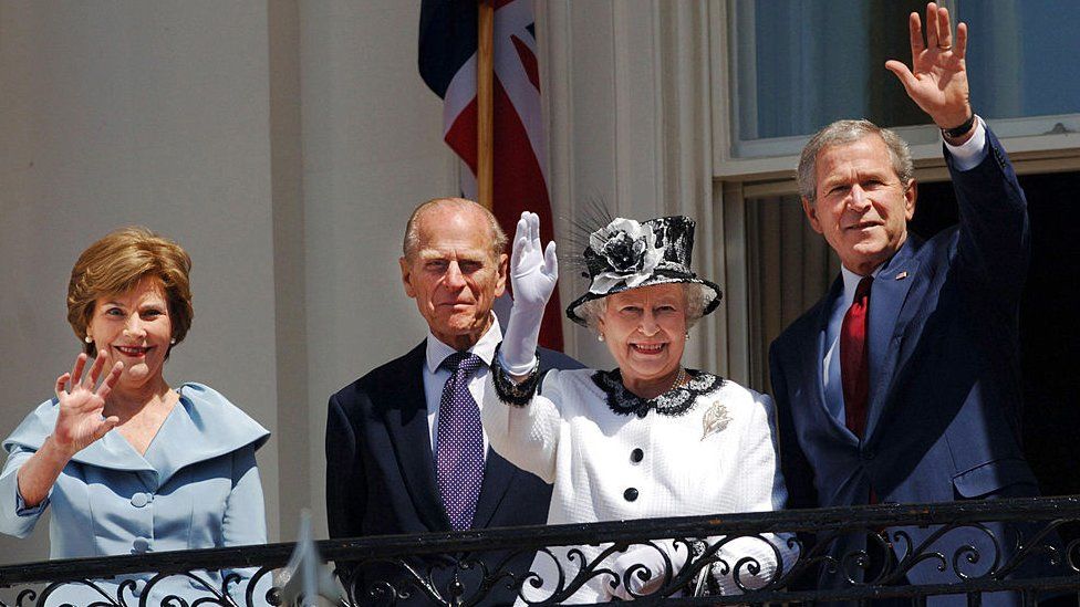 Queen Elizabeth II and the President of the United States of America George W. Bush are accompanied by their spouses, Prince Philip, Duke of Edinburgh and Laura Bush, on the balcony of the White House, Washington DC, on May 7, 2007