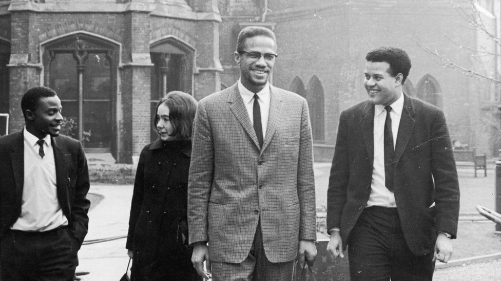 Eric Anthony Abrahams (right) with Malcolm X in Oxford, December 1964