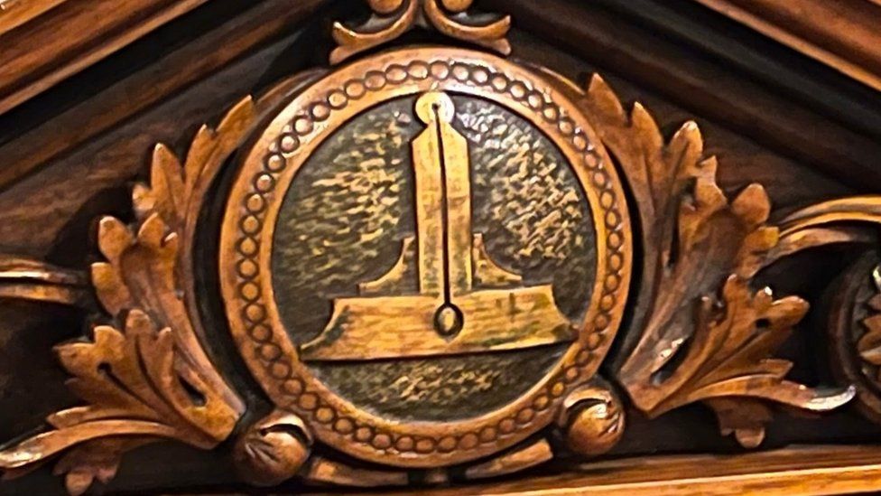 A Freemasons symbol on a chair