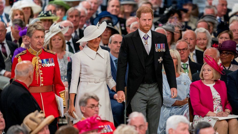 Prince Harry and Meghan walk down the aisle at the national service of thanksgiving