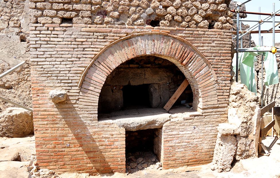 The oven, big enough to be producing 100 loaves of bread a day