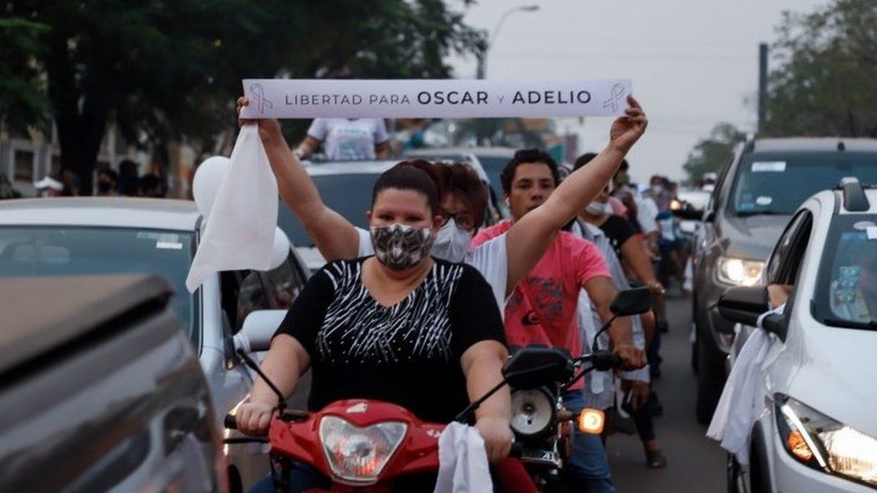 People participate in a demonstration in Concepcion, Paraguay, 13 September 2020.