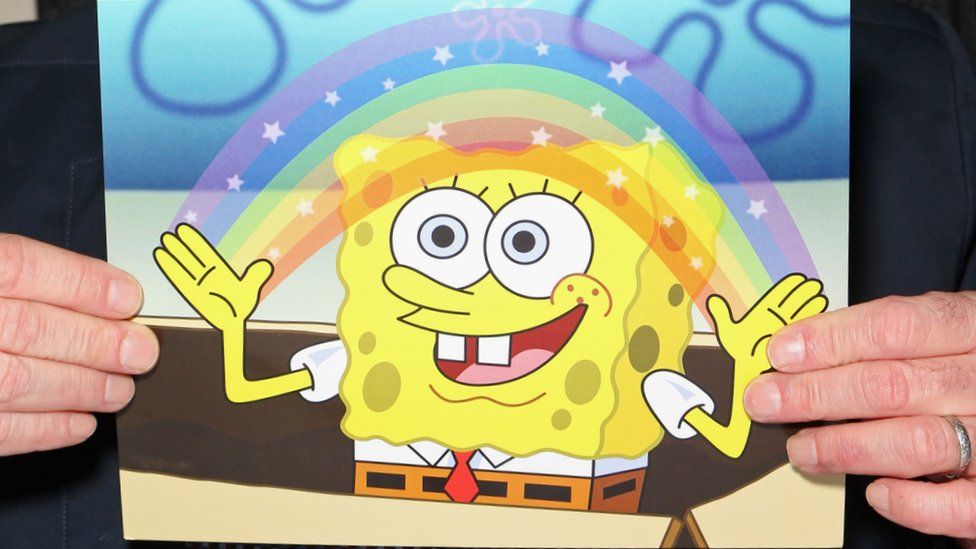 SpongeBob making a rainbow with his hands