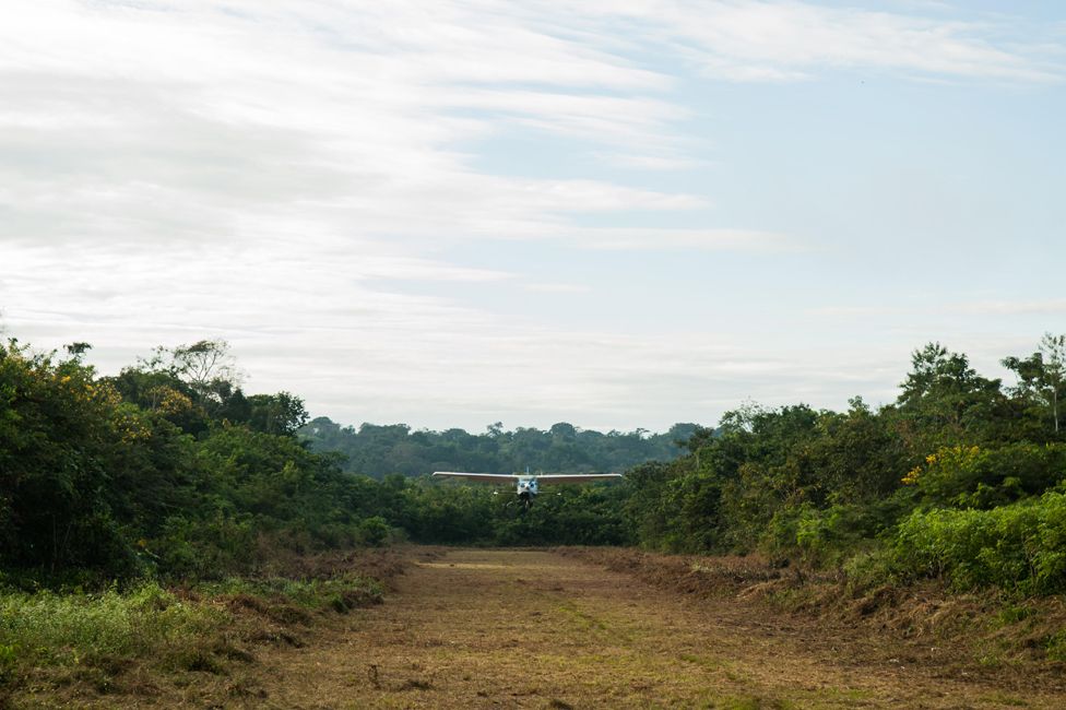 A small aircraft landing at Aldeia Baú, Para State, Brazil