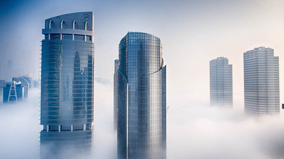 Skyscrapers above the clouds