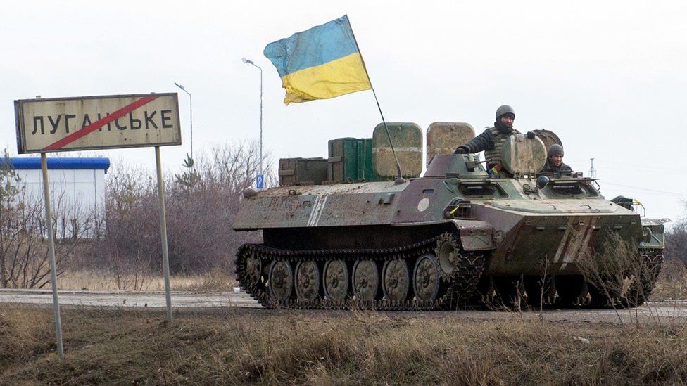 A tank displaying a Ukrainian flag in the Donetsk region