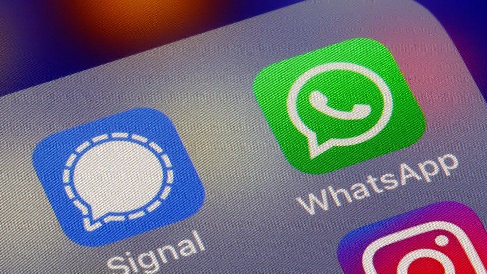 A screen shot of signal and Whatsapp encrypted messaging apps