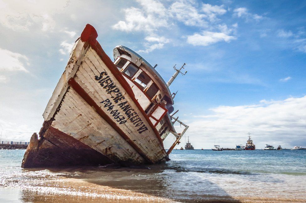 A stranded ship on the shore of San Cristobal Island
