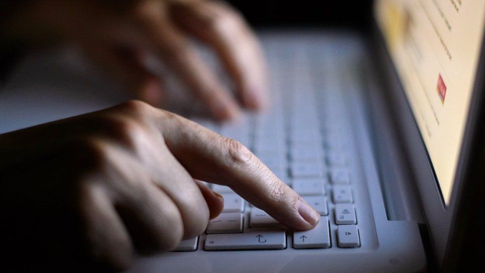 A file photo of a woman using a laptop